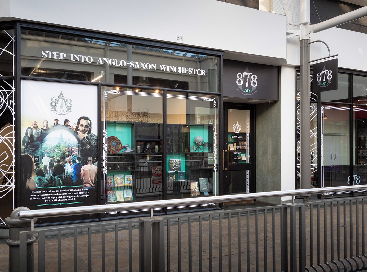 A shop front with 878 AD branding