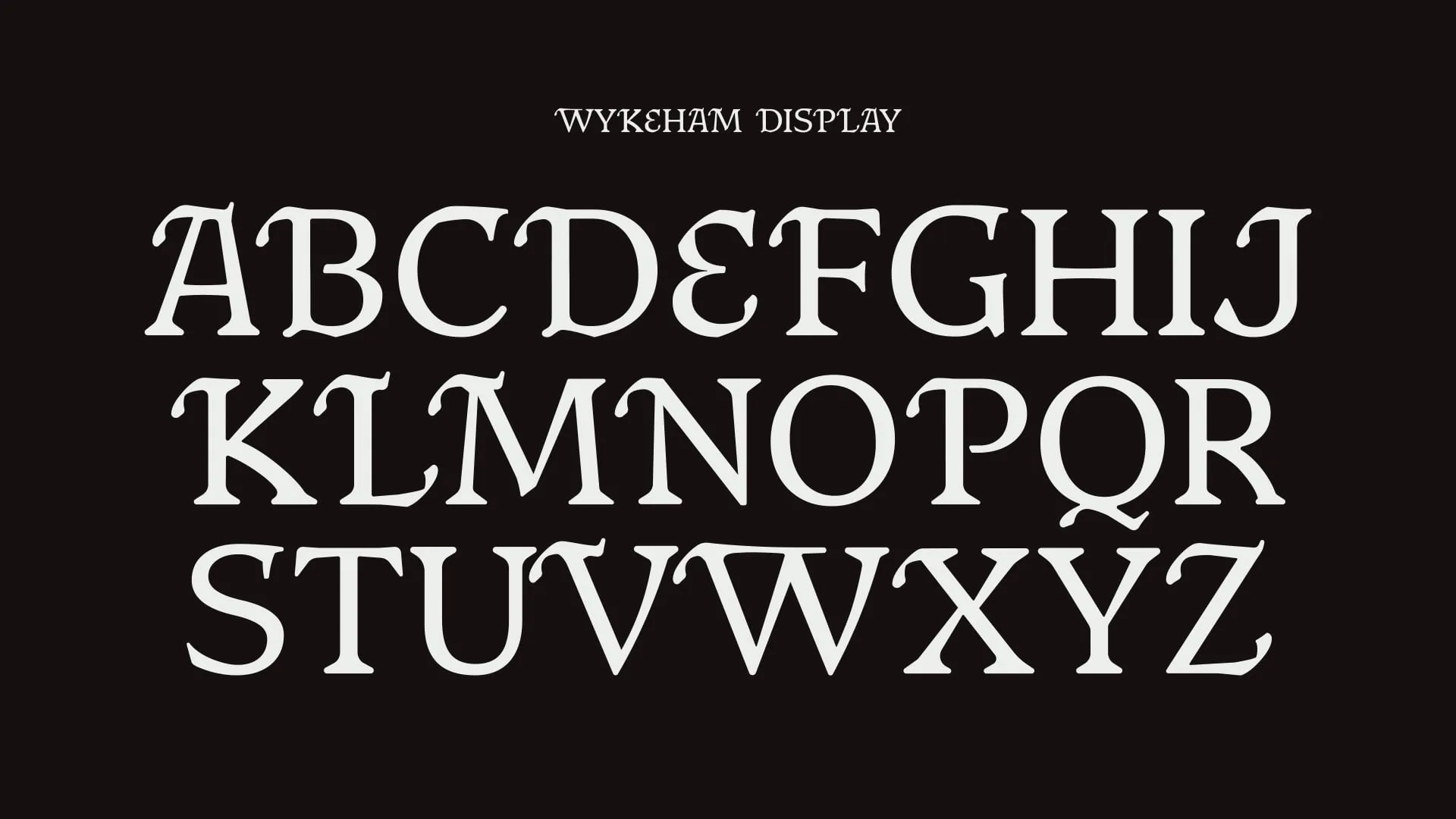 Alphabet specimen showing the Wykeham Display typeface in large cream letters against a black background