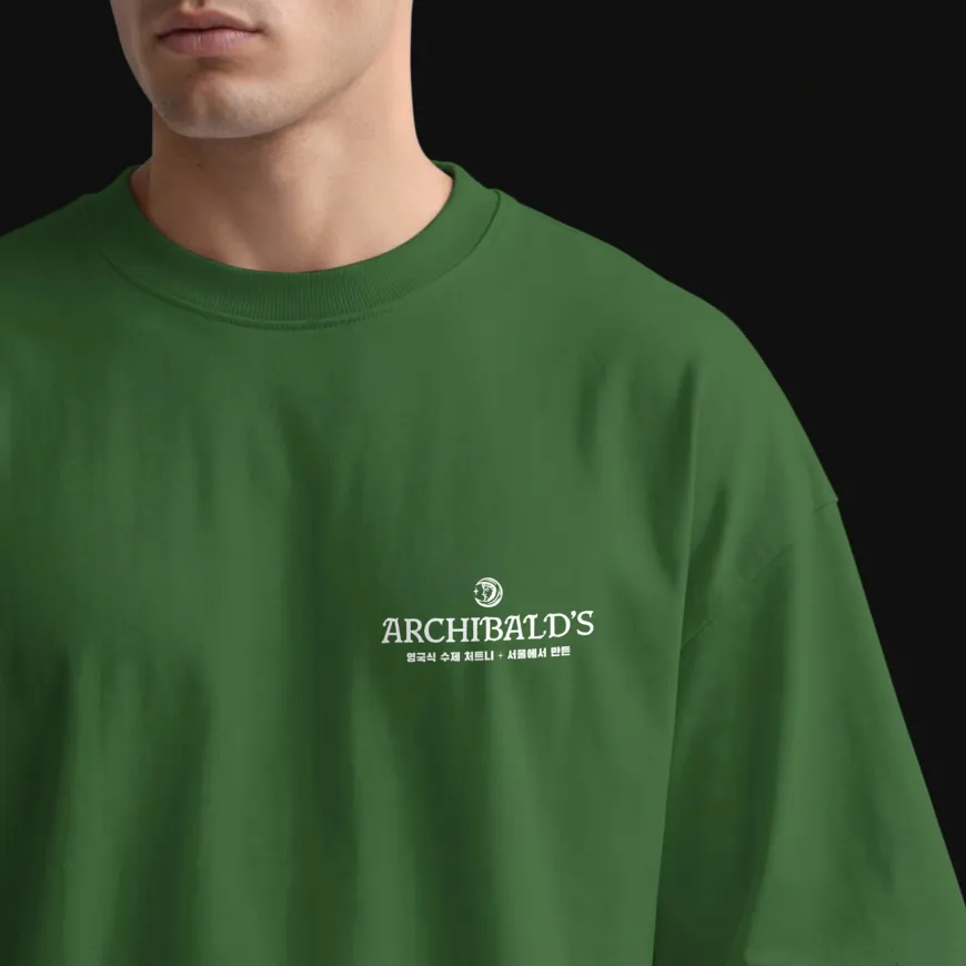 Man wearing green t-shirt branded with Archibald's chutney