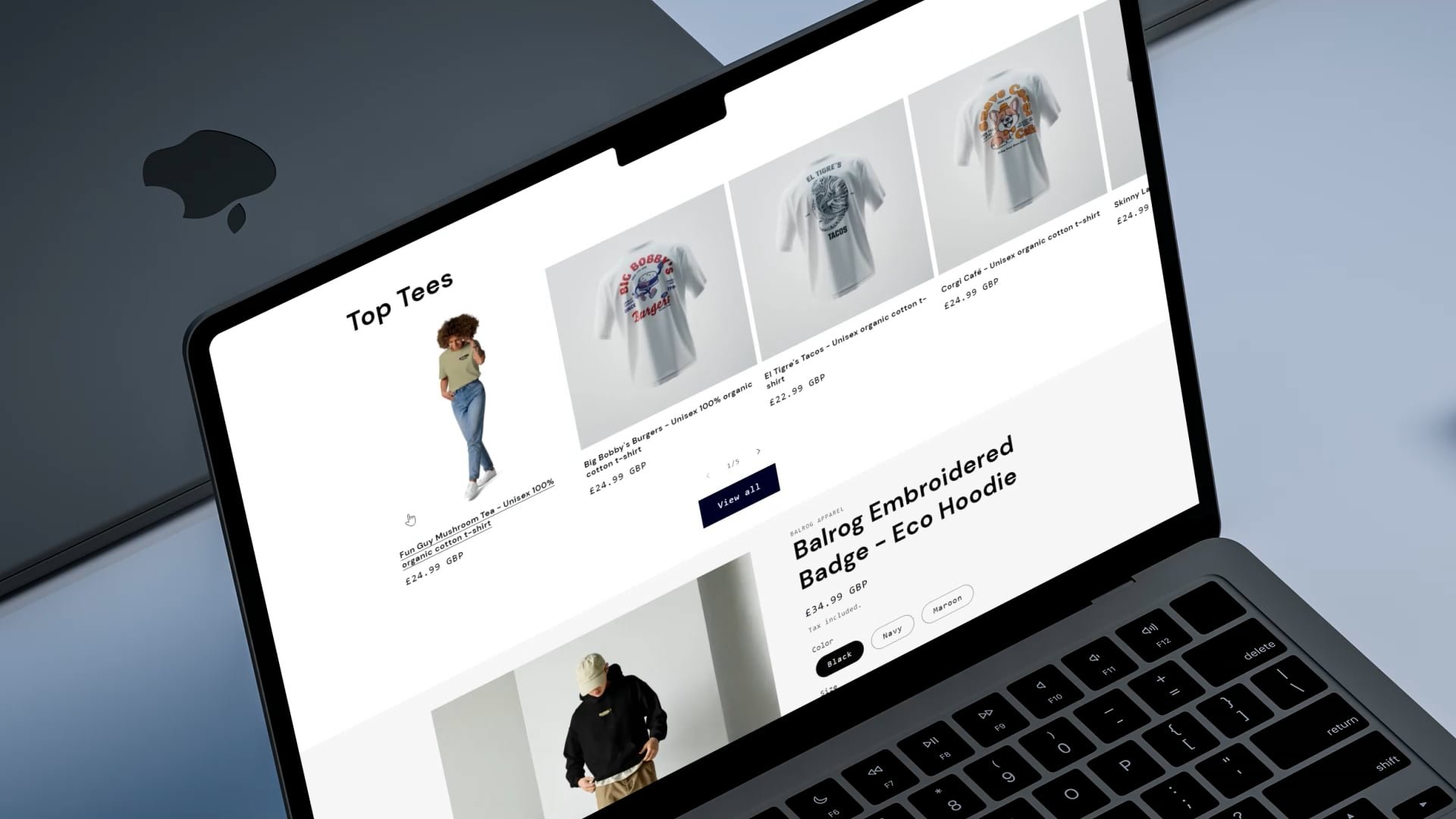 Close up of a apple laptop open on Balrog apparel website