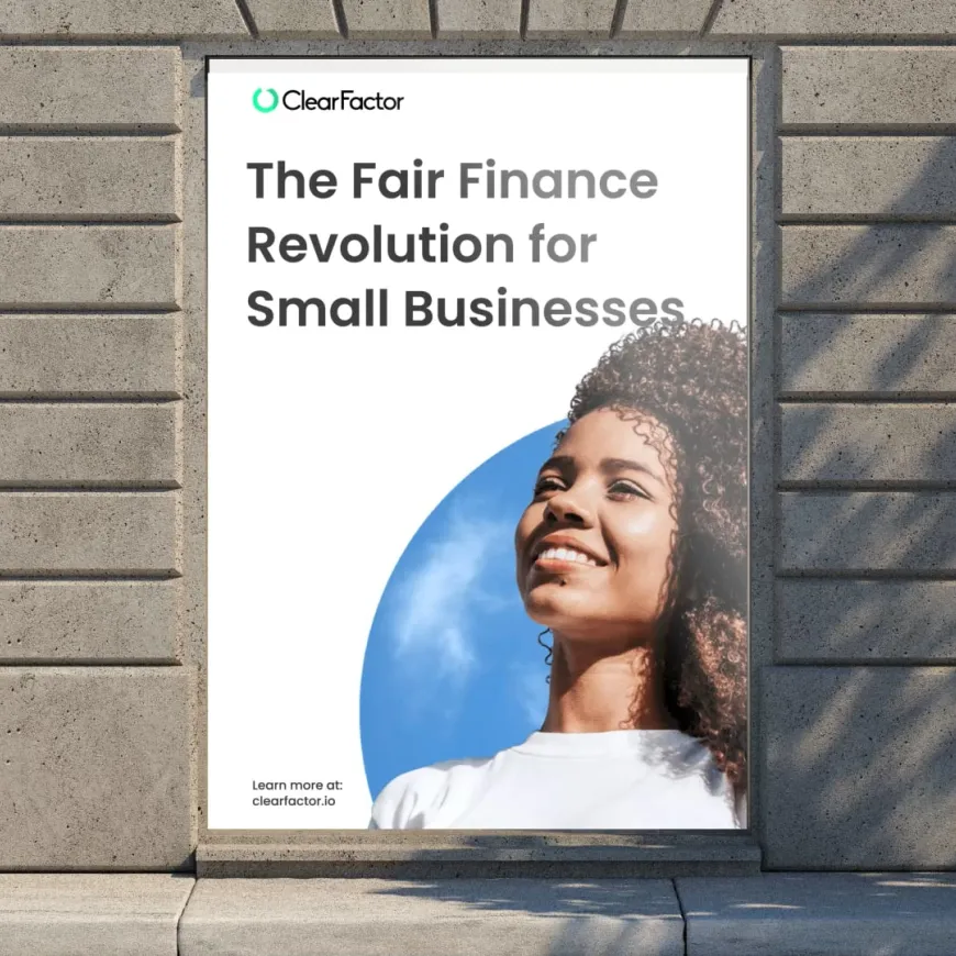 a stone wall with a white poster and text 'the fair finance revolution for small businesses'
