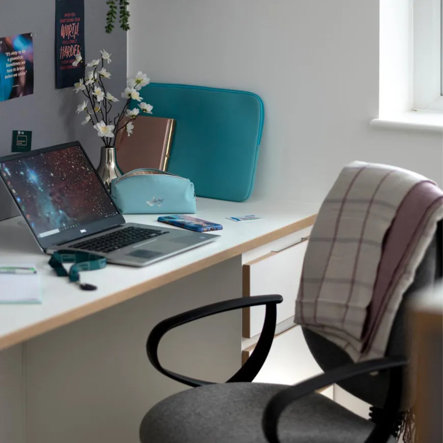 Close up of home desk working area and office chair