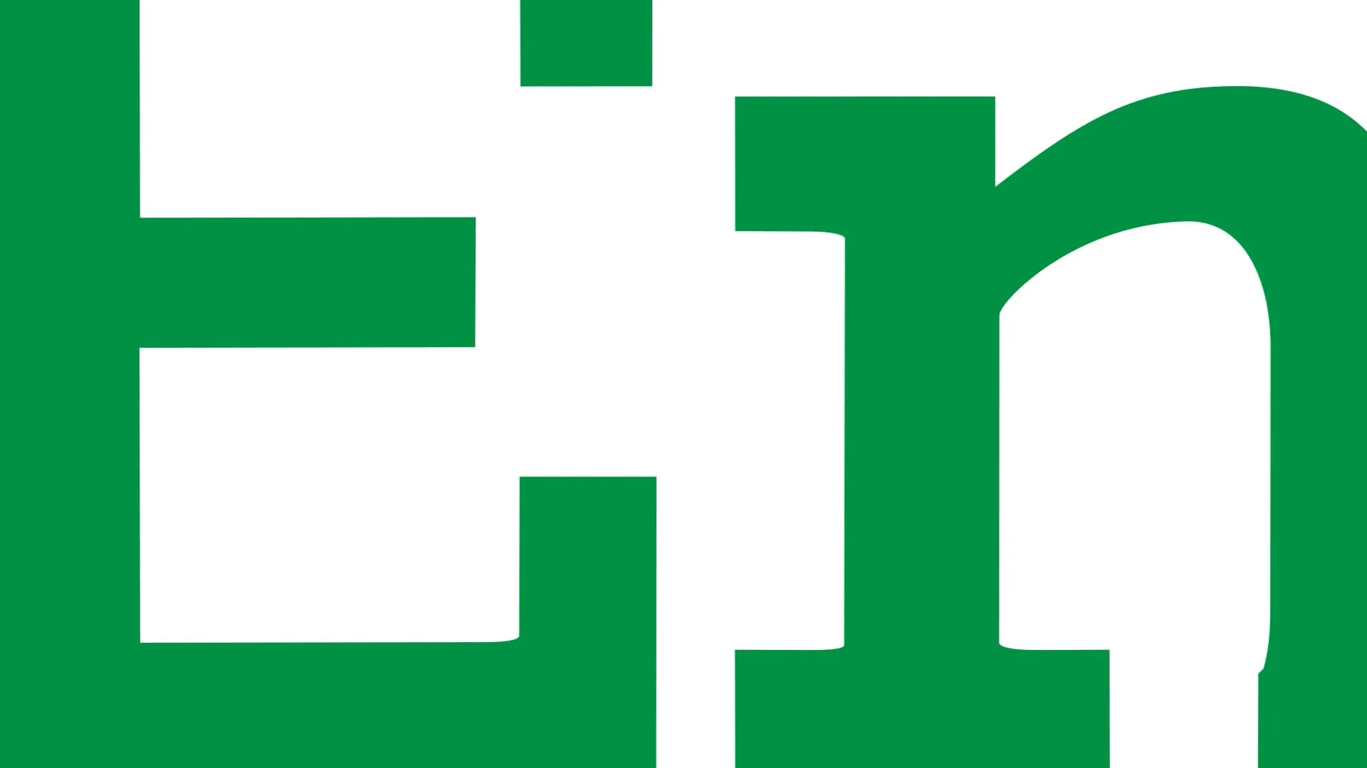 Abstract close-up of the English Naturally logo in green and white