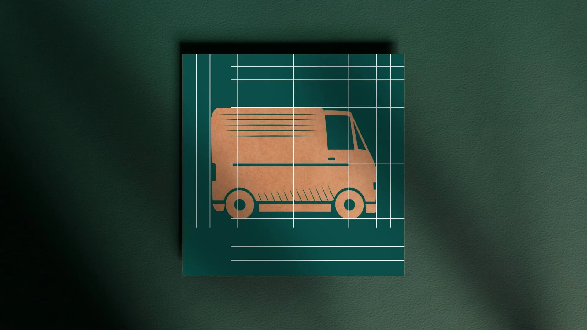 a green card with a cardboard delivery van with white lines on