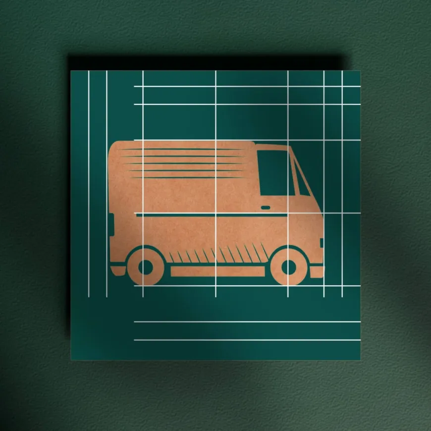 a green card with a cardboard delivery van with white lines on