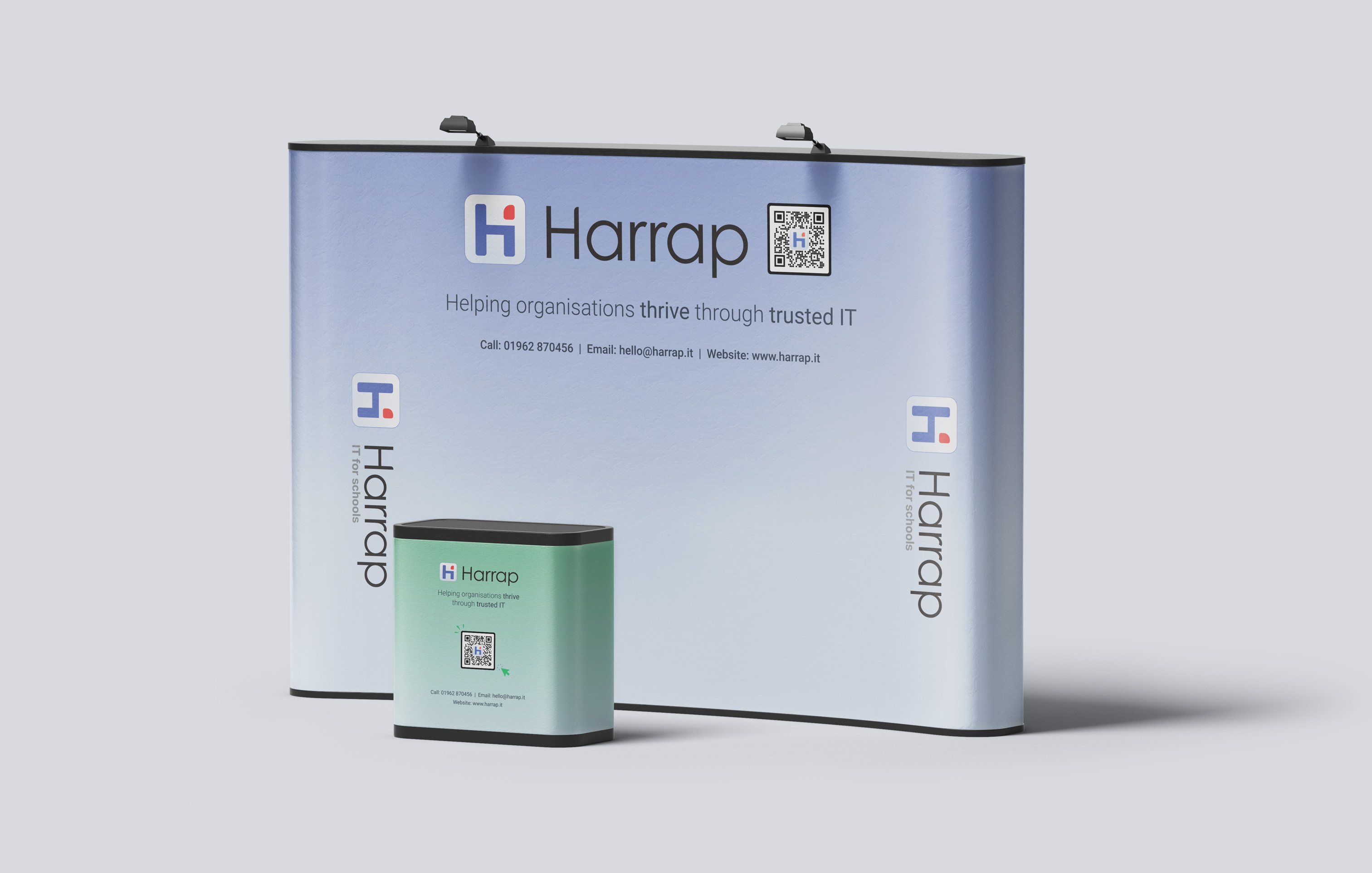 Mockup of a Harrap exhibition stand with slogan and QR code