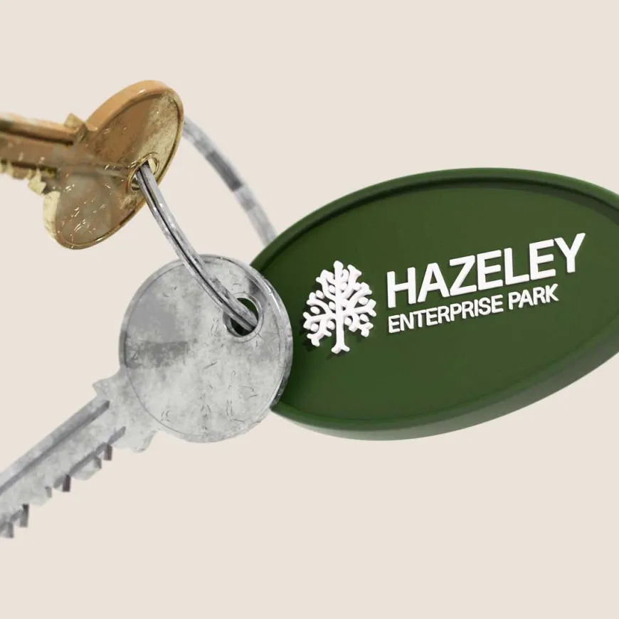 Keys with a Hazeley enterprise park green tag with logo embossed