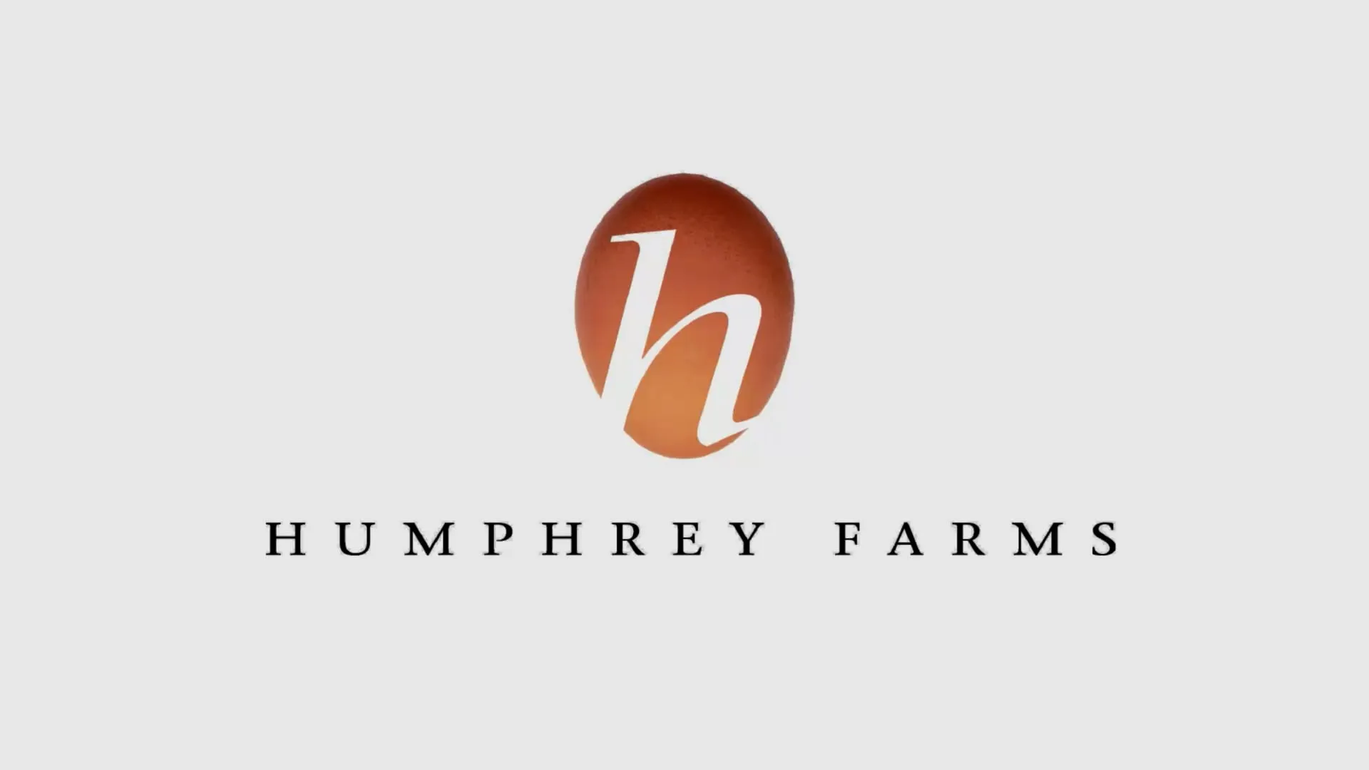 Humphrey Farms logo featuring a stylised lowercase “h” inside an orange circle above the company name