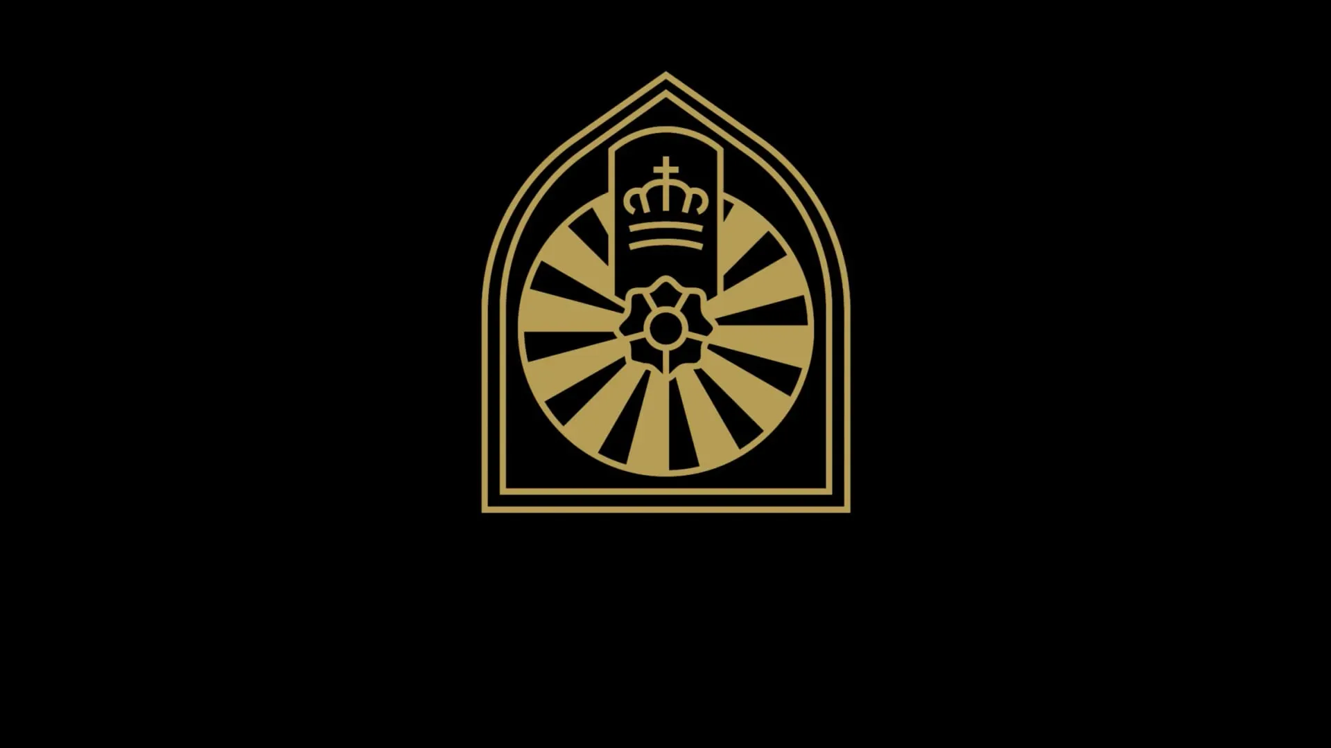 a black background featuring a round table logo in gold