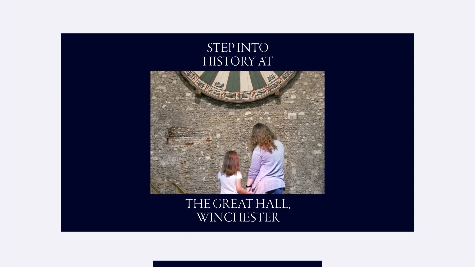 a dark blue screen with the words step into history at the great hall winchester featuring a mother and child