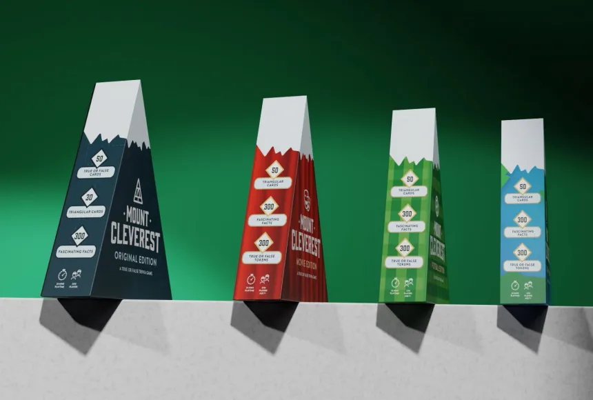Four triangular shaped card game boxes in a row