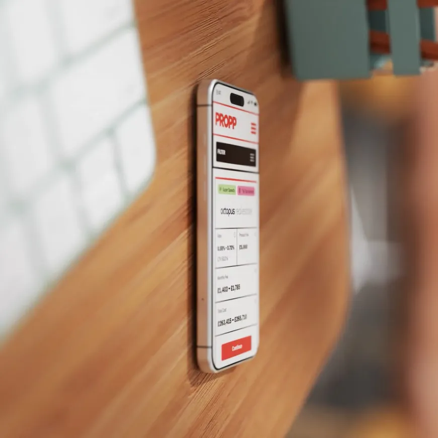 Phone laying flat on blurred desk