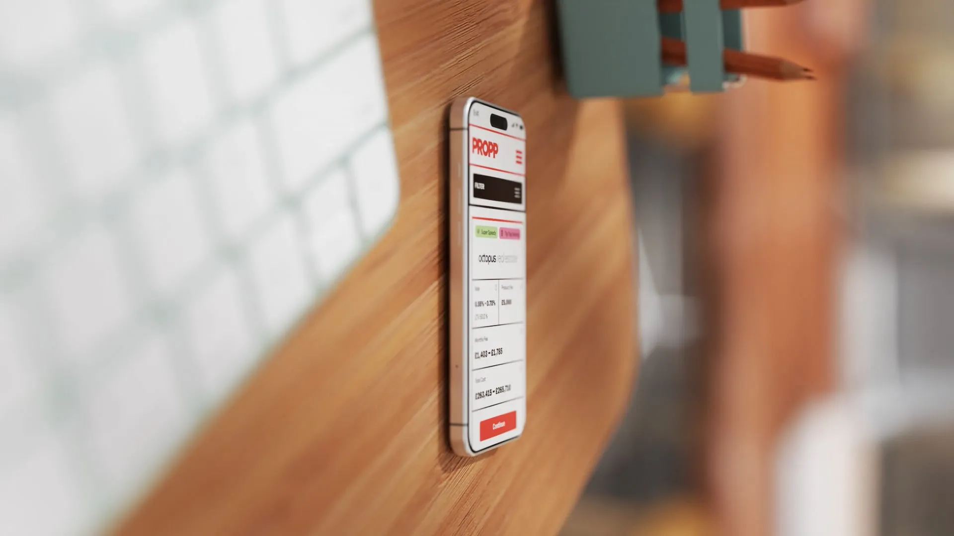 Phone laying flat on blurred desk