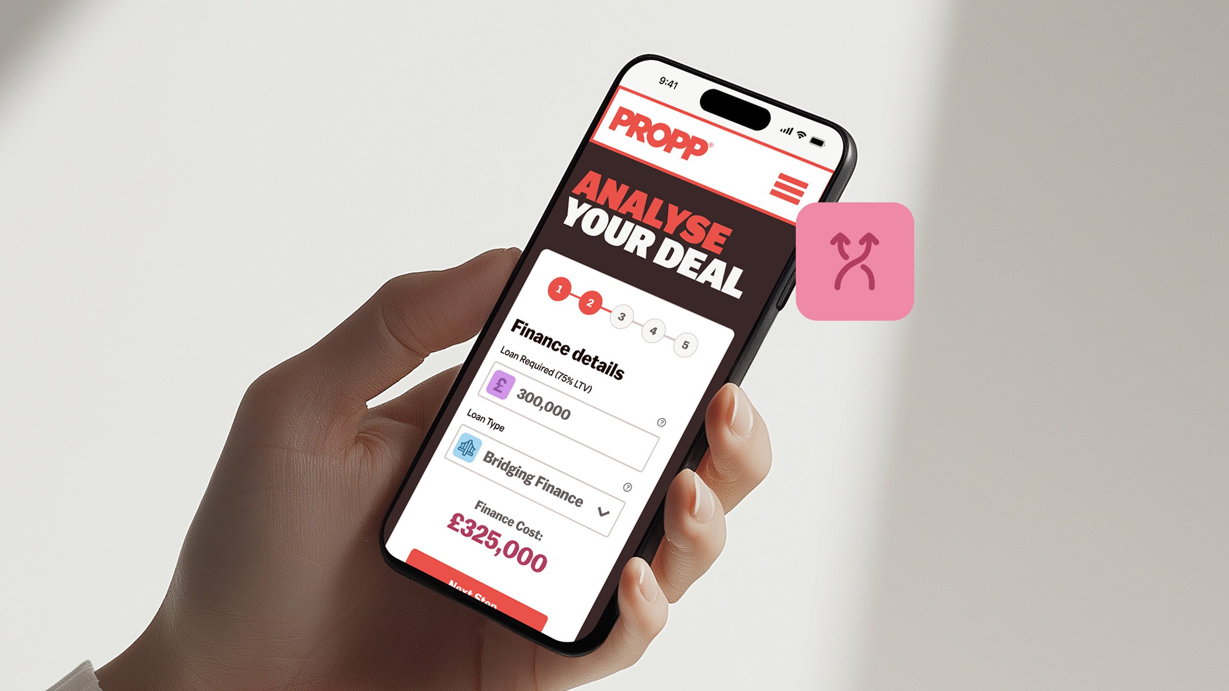 Hand holding mobile open on Propp website
