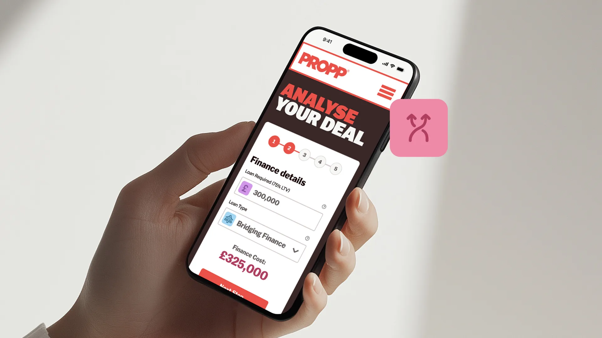 Hand holding mobile open on Propp website