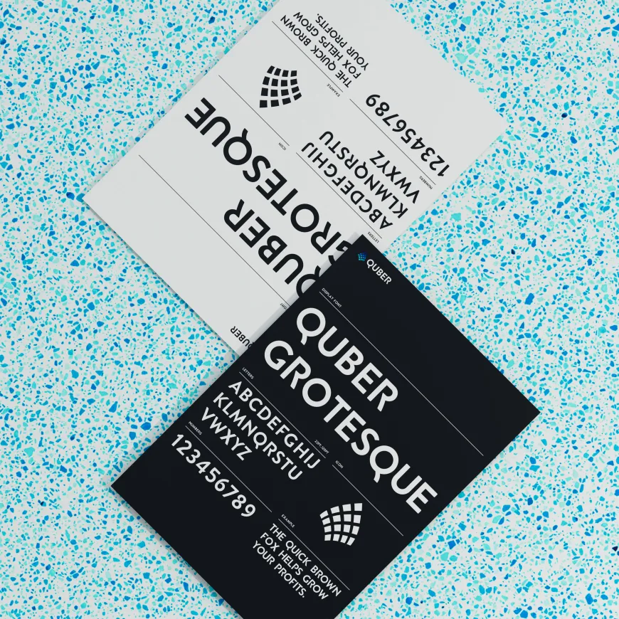 Two cards, one white one black showing the alphabet and font choices