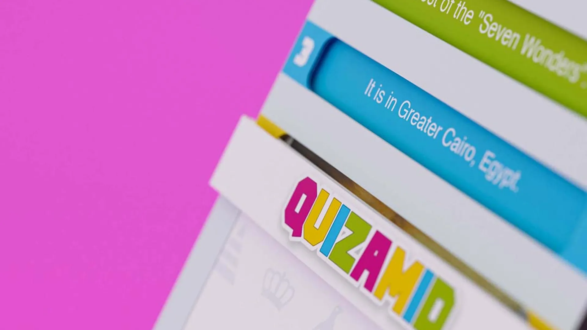 Closeup of quizamid logo on game box.