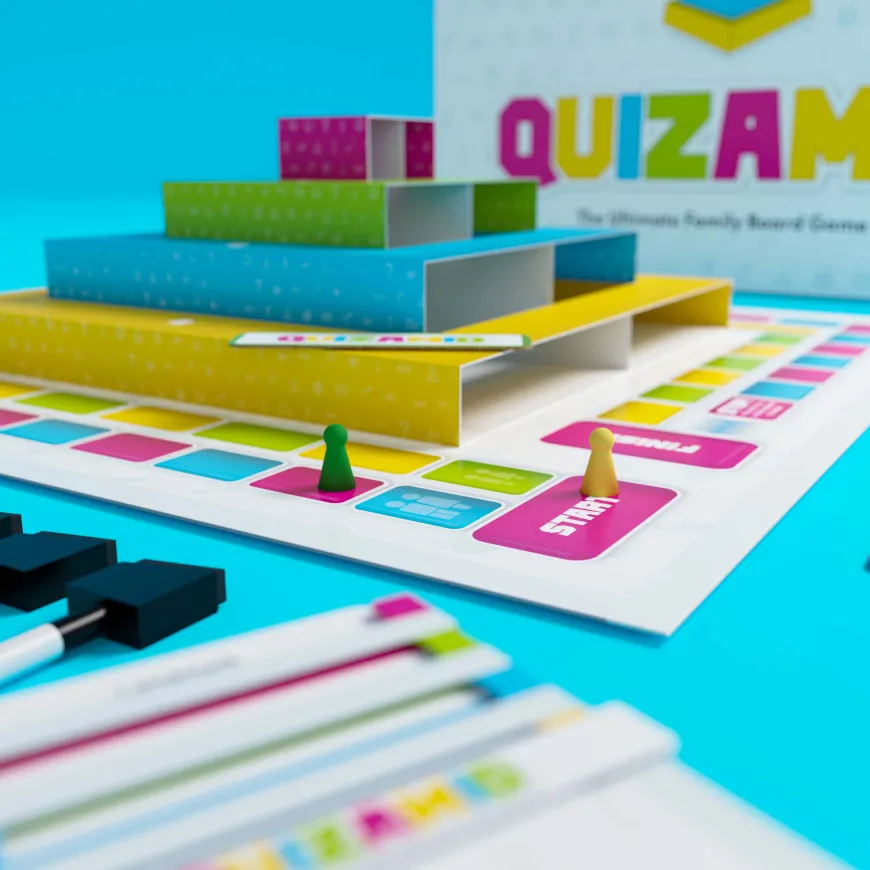 Quizamid game board laid out with player counters and marker pens.