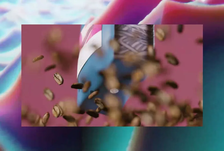 Coffee beans falling in a pink square, behind them is a blue coffee bag
