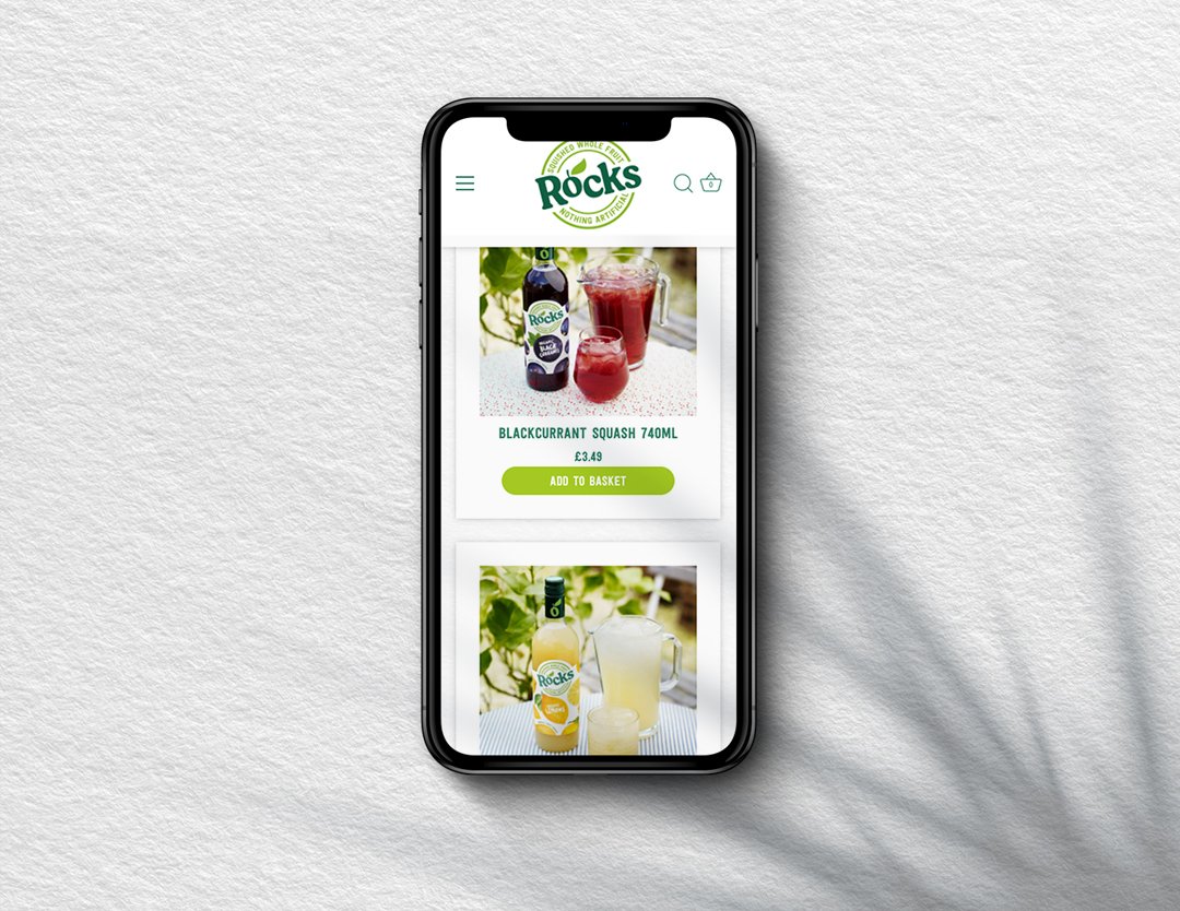 a mobile phone featuring the rocks drinks webpage