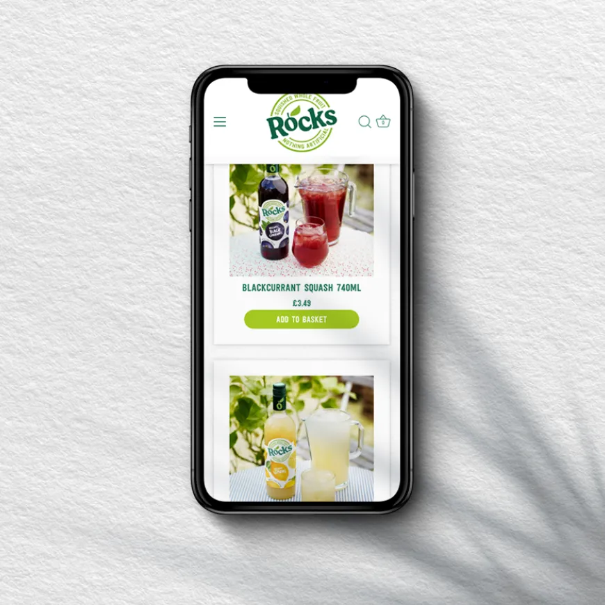 a mobile phone featuring the rocks drinks webpage