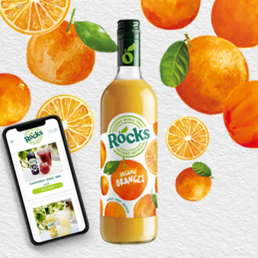 a bottle of orange juice and illustrated oranges