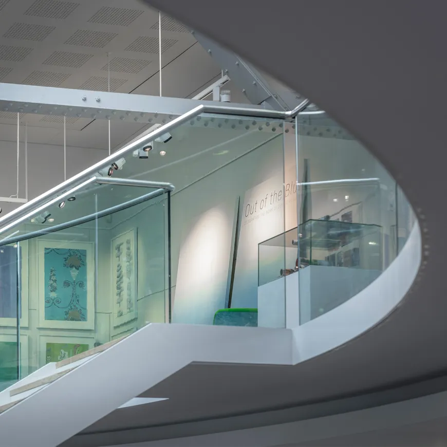 a view from the ground of a glass fronted staircase