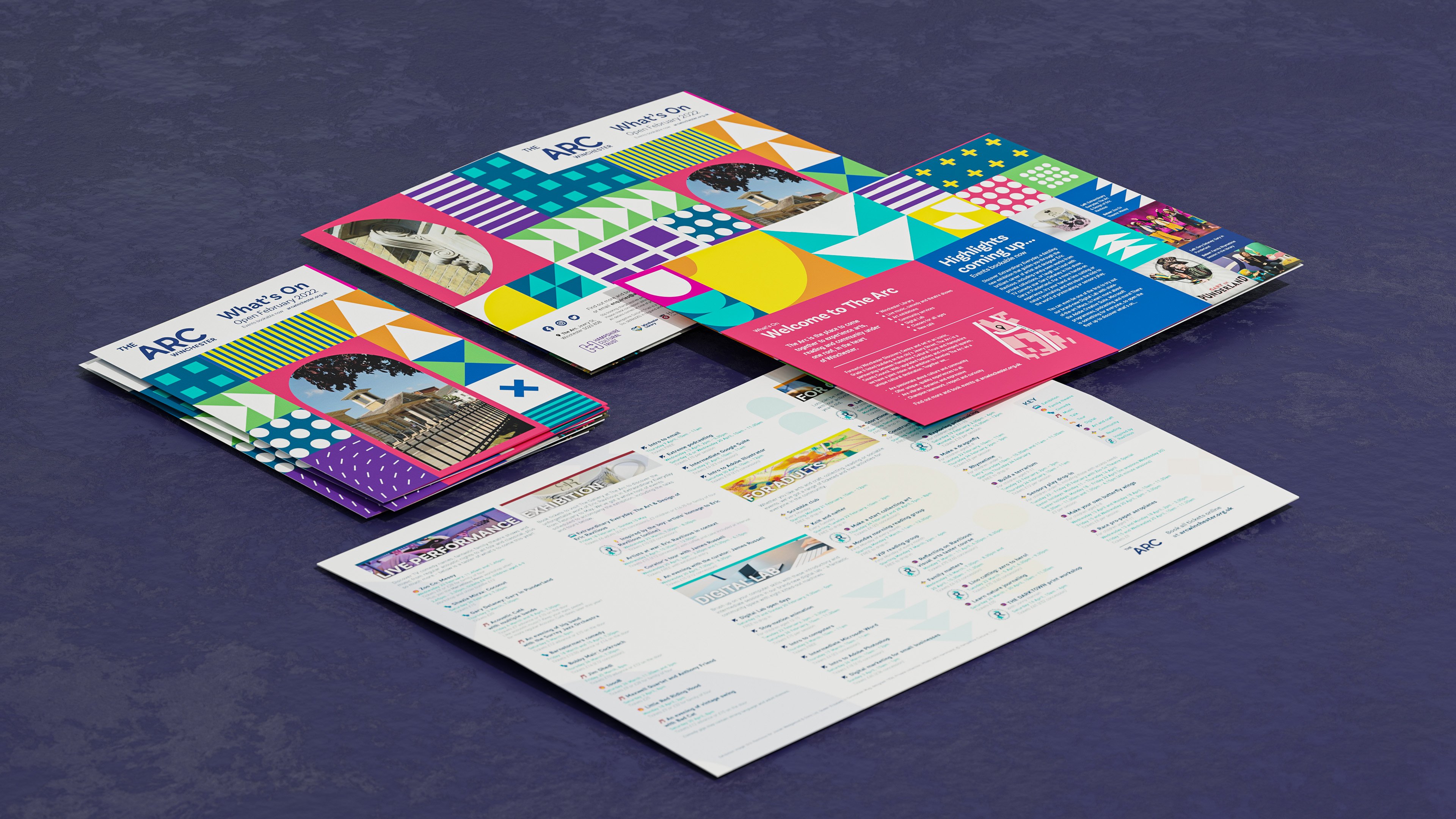 A flat lay image of a brochure design featuring vibrant colours and iconic shapes