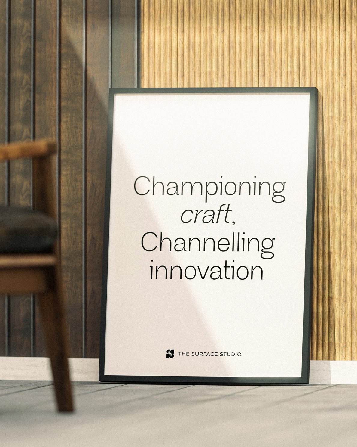 Poster leaning against a wall with the text “Championing craft, Channeling innovation"