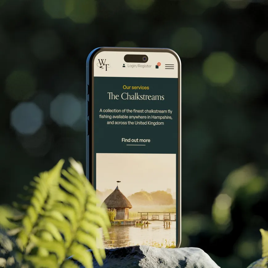 Mobile phone render with Wilde Trout website open on services page.