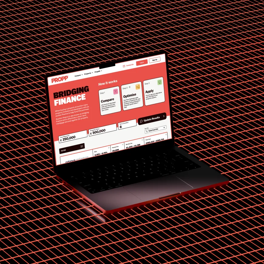 A render of a laptop on a red goemetric backgorund
